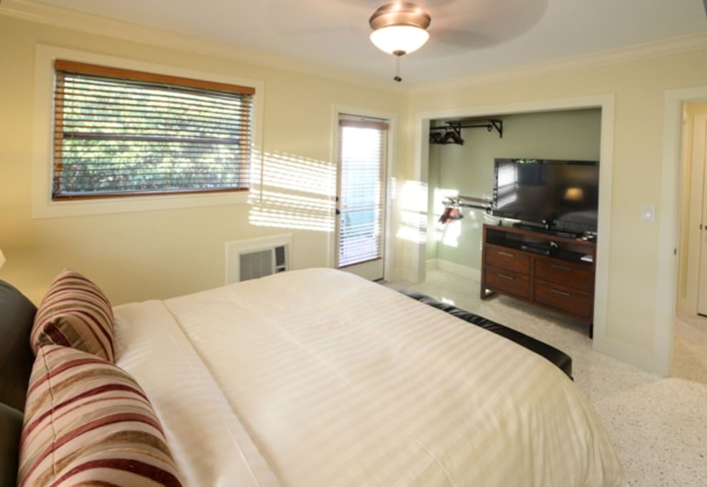 Queen Size Bed with 55" TV