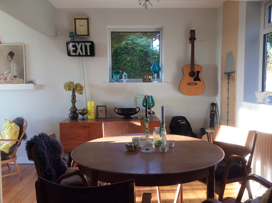 Open plan dining area. Table opens out to seat 8