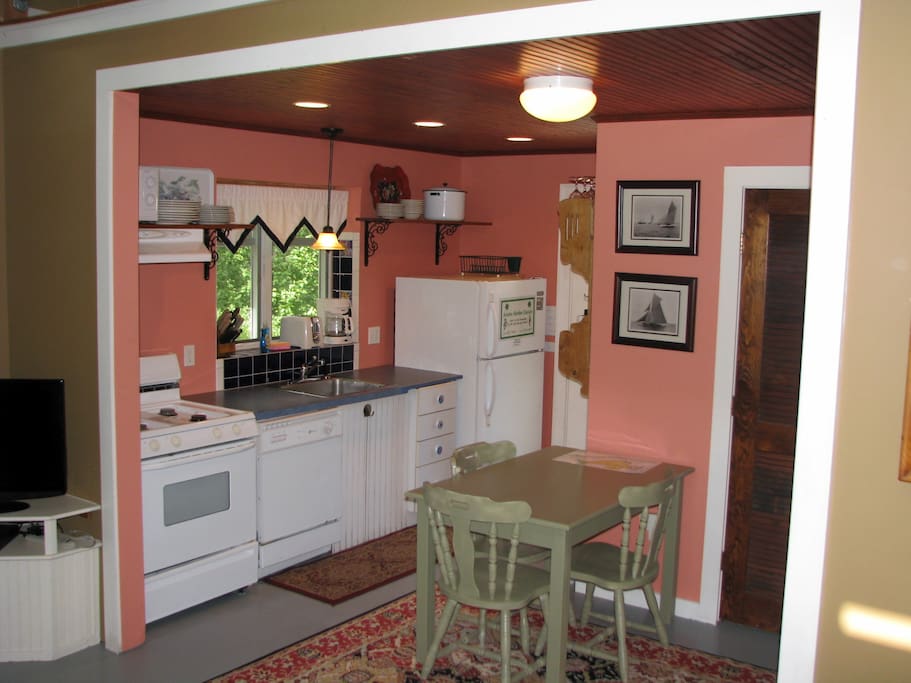 Kitchen leads to Deck with dining
