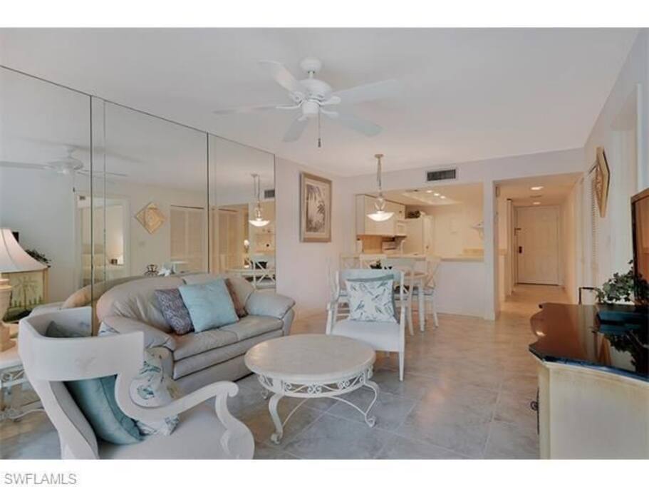 Living room with 55in TV screen.