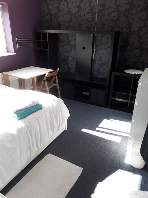 Large upstairs room with double bed, chest of drawers table chairs.
Tea/coffee facilities. Plenty of cupboard space. Hairdryer,laundry service(£5 per wash load (washed and dried £10 if ironed)
Towel rail,bedside table with lamp and fan unit if required. Towels, wall chart with pins.