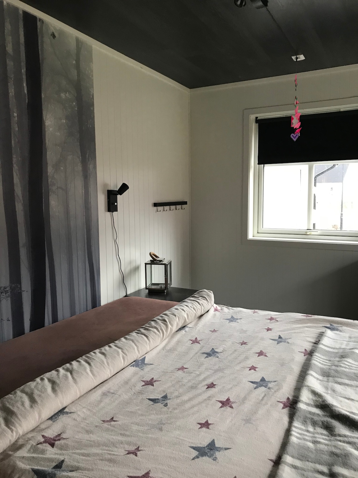 Large double bed 180 * 200.
Space for a small extra bed if needed, but it will be crowded.
Bed can be moved to the window and make room for a small cot if desired.