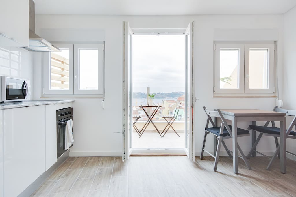 Kitchen with doors to the terrace