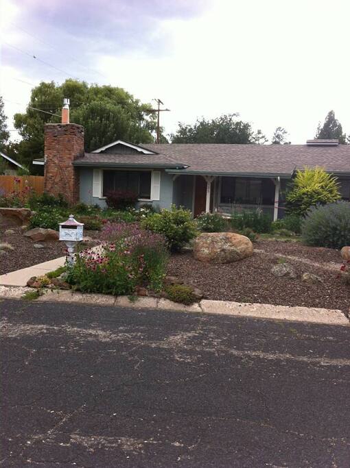 Fully landscaped, charming exterior.