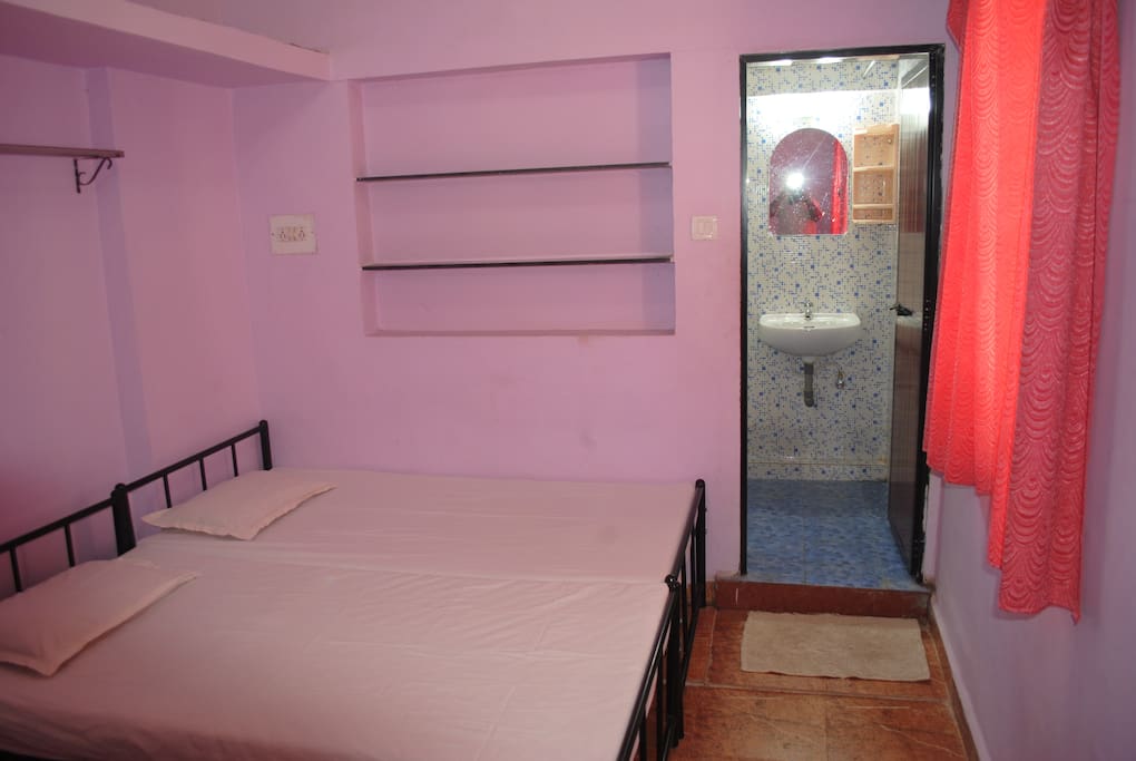 AC bedroom3 with 4 single beds and attached bathroom