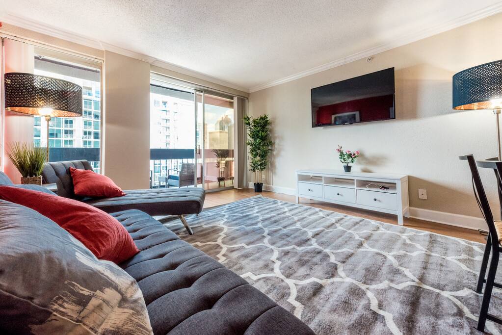 Enjoy a relaxing afternoon in a spacious living room. Spend the night in with friends around this 55" 4K HDTV.