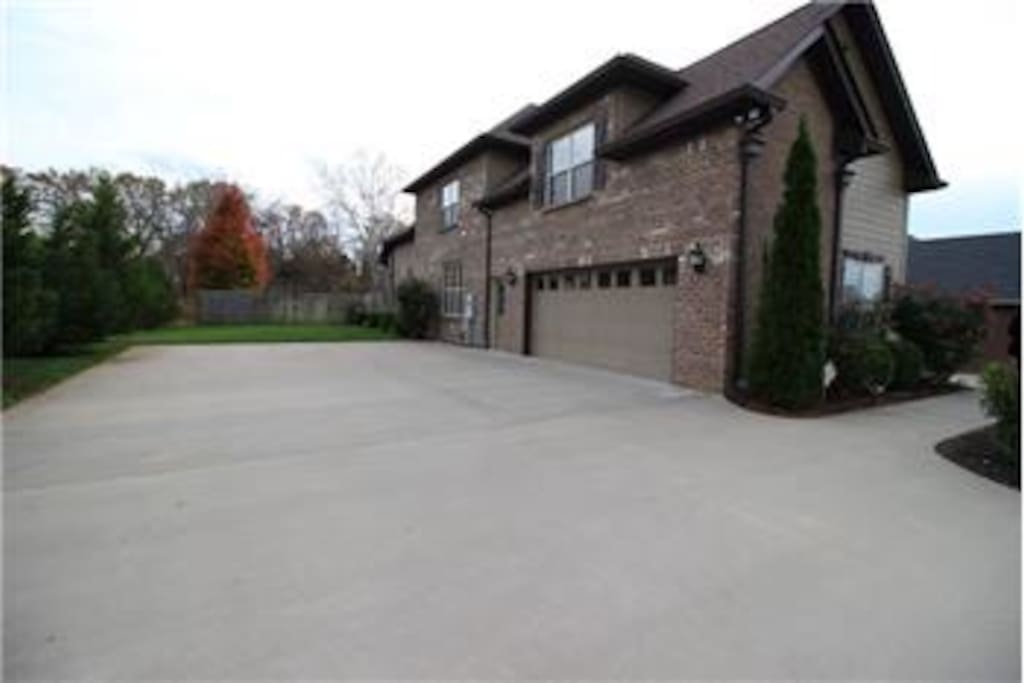 Ample parking for guests in a private well-lit driveway.