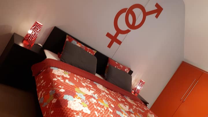 Red bedroom, 1 double or 2 single beds.