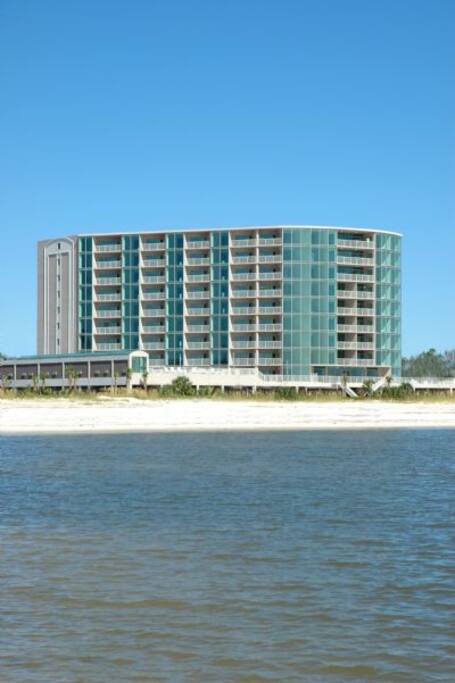 View of condo building from water.