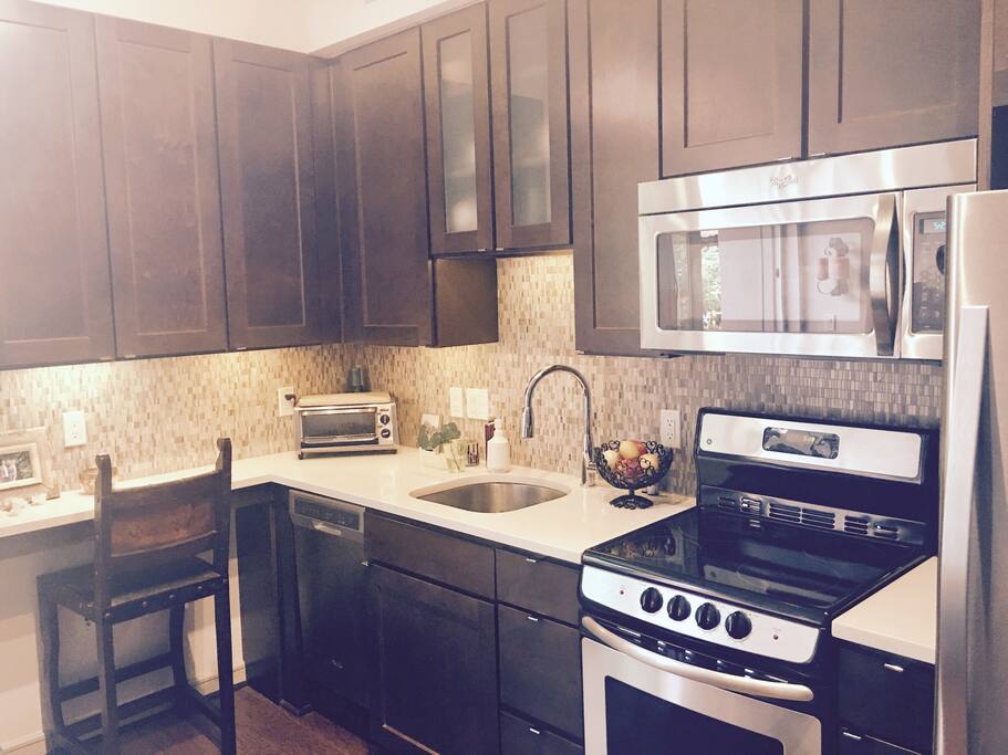 Full Kitchen, with all natural cleaning products, coffee, tea, water, ice, emergency meal and a fresh treat.