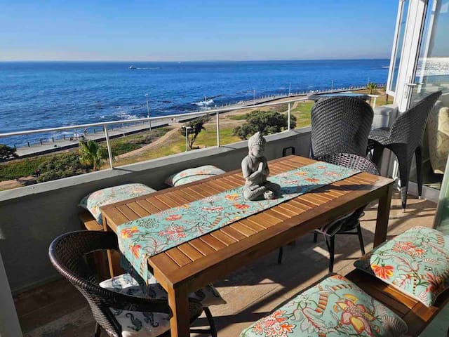 Panoramic sea views from stylish beachfront flat