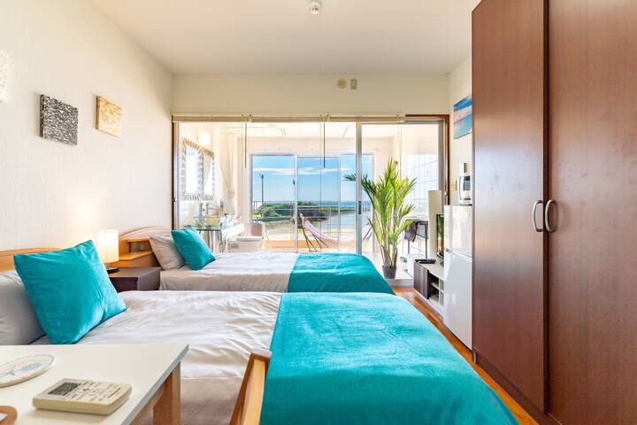 B/Tropical resort style with private beach