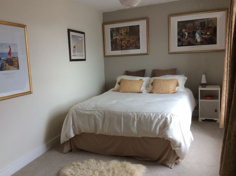The bedroom has a king size bed