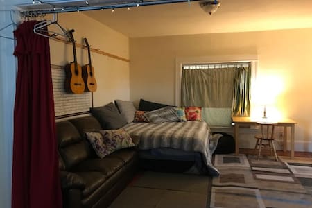 Near Everything! Living room space, semi-private