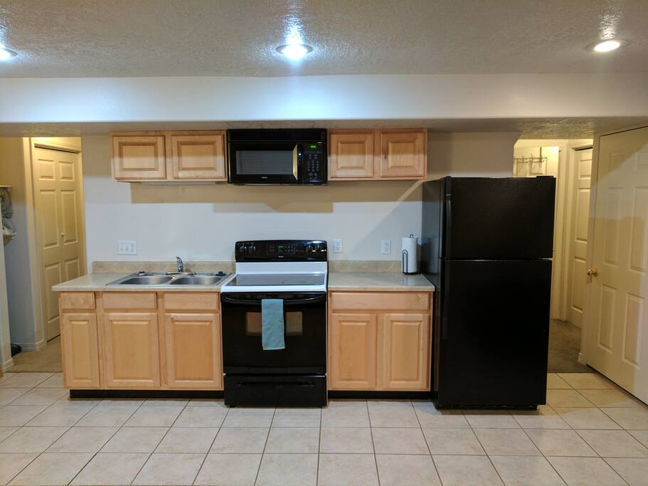 Kitchen has pots and pans etc.