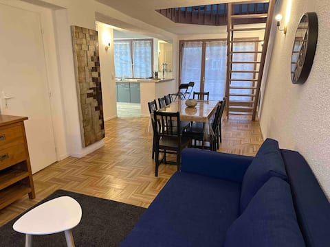 Spacious apartment with covered terrace and garage.