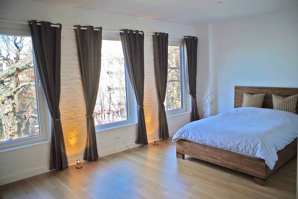 Spacious Bedroom with beautiful light.