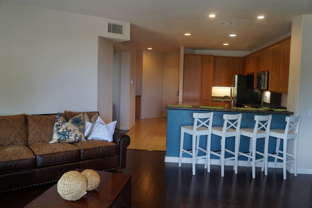 Open space GREAT room with kitchen/balcony/living space flow