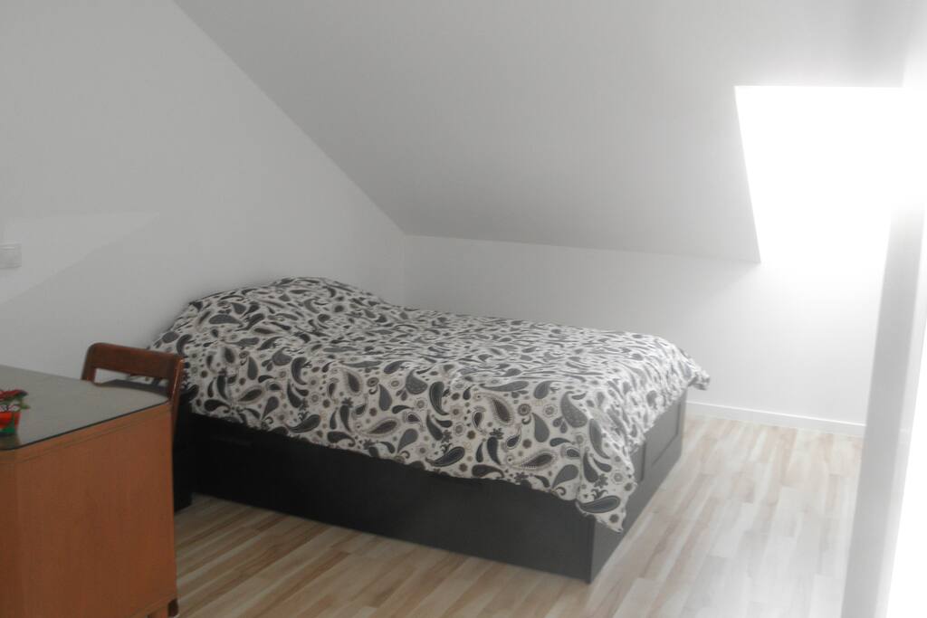 Queen Bed with ensuite Bath and Desk