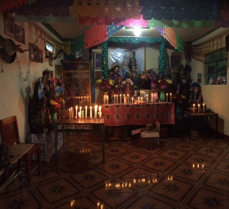 The family has a Mayan altar/ Cofradia in the home