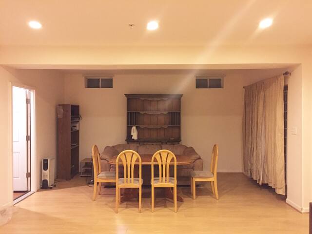 Nice walk-out suite w/ Living, Bed, and Kitchen+