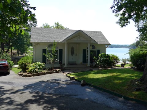 Top performing Airbnb: Beautiful cottage w/deck extending over the water in Hot Springs
