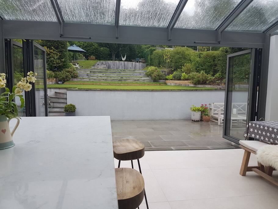 Kitchen opens out onto patio, perfect for entertaining