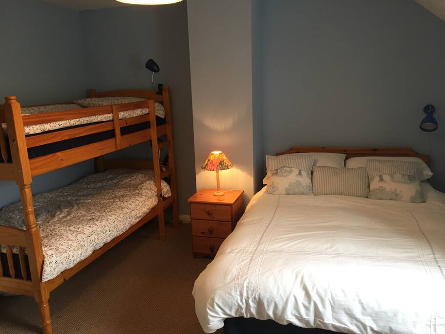 Bedroom 1. Bunks and Double Bed. Chest of drawers, cupboard & hanging space.