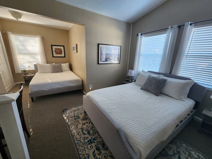 Cozy bedroom on 2nd floor with 2 queen size beds and a half bath
