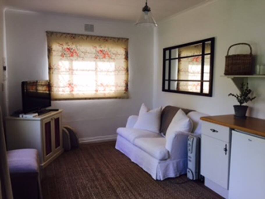 Stylish TV Room
Comfortable sofa, view of leafy garden