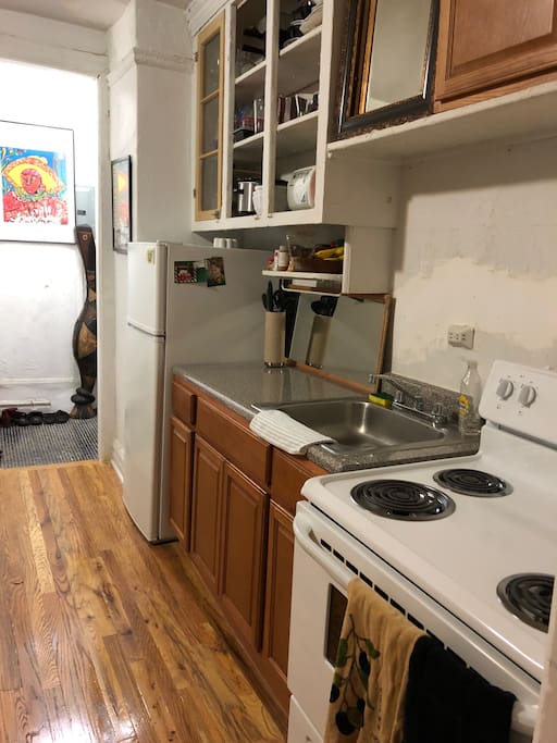 Full kitchen with basic dishes and cookware