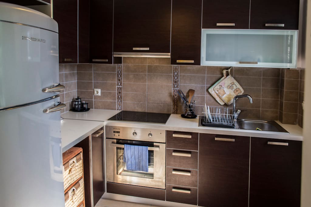 The kitchen is fully equipped with modern appliances. It includes an electrical oven, fridge/freezer, coffeemaker and all basic utensils.