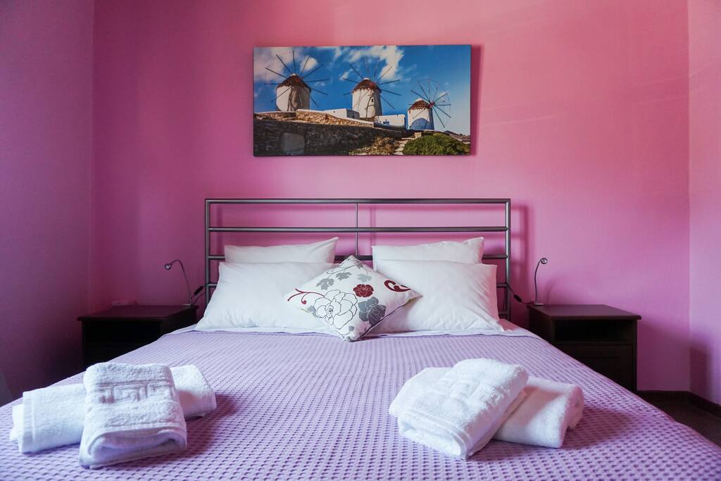 The double bed in Bedroom #1
