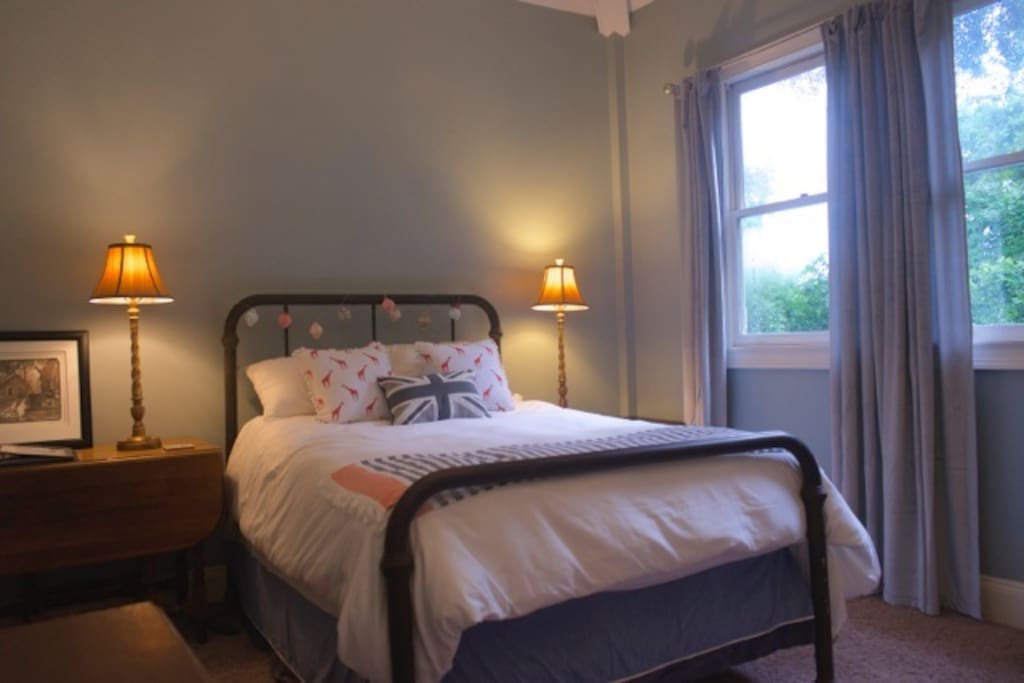 Antique brass double bed with Amerisleep mattress.