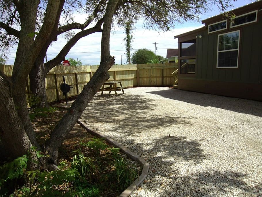 Each cottage has its own picnic table and charcoal bbq pit. The property is fenced for privacy.
