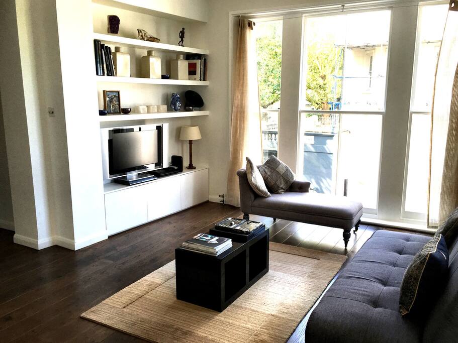 Living room, cable tv, and great views.