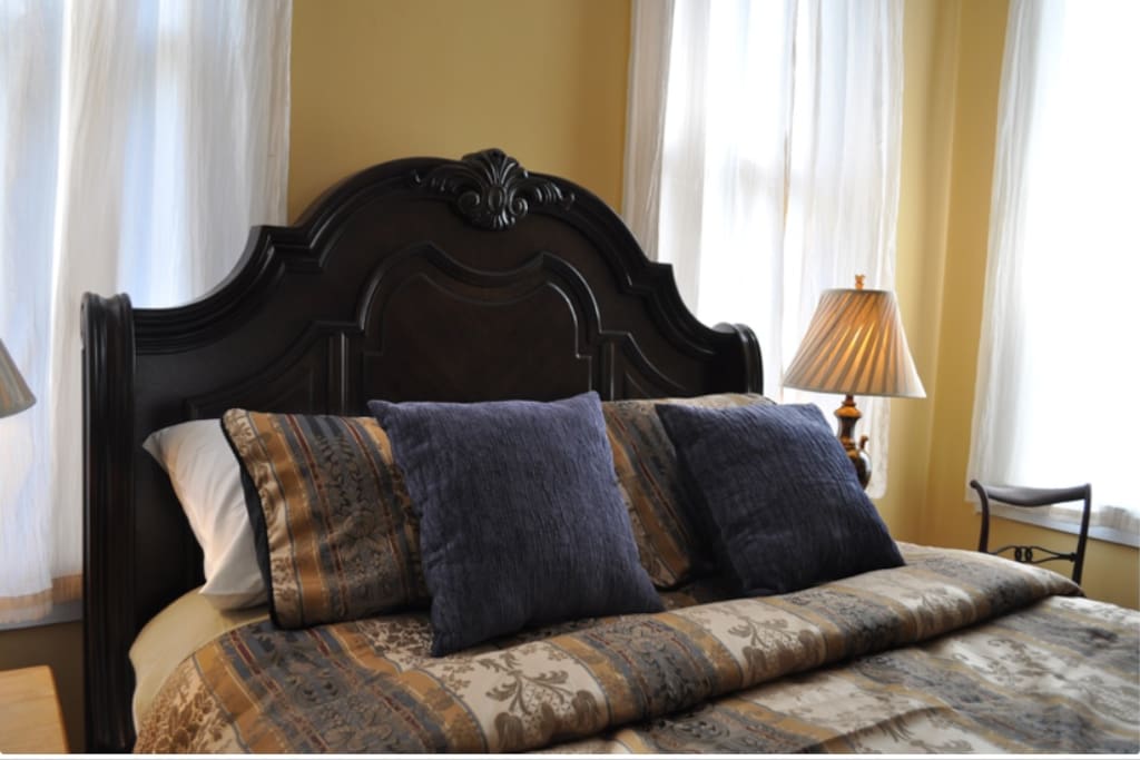 The Azalea Room has a queen bed, private en-suite bathroom, and direct porch access. All bedrooms have a 42” flat screen HDTV with DirecTV and high speed wifi.