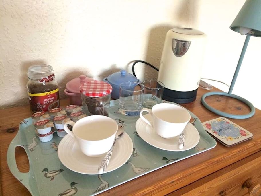 Tea and coffee making station in your room, biscuits may vary!