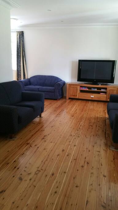 Large lounge, separated from the kitchen/ family room. Plenty of space with separate areas to spread out.