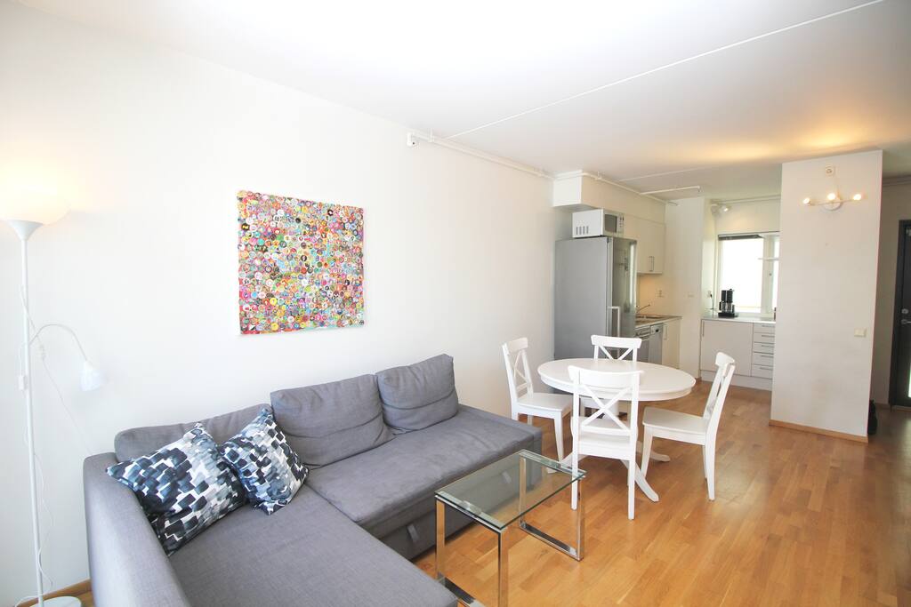 Living room with dining area and kitchen.