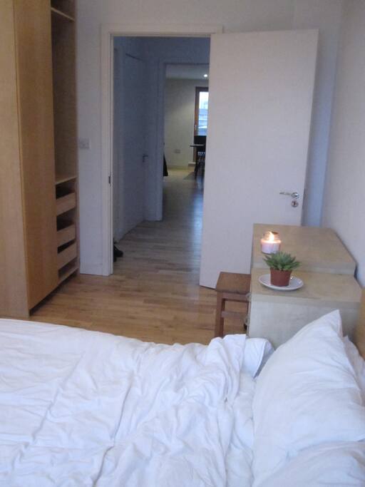 Large comfy bed, computer desk, wardrobe and drawer storage. Room opens out into spaceous hallway and large open plan living area.