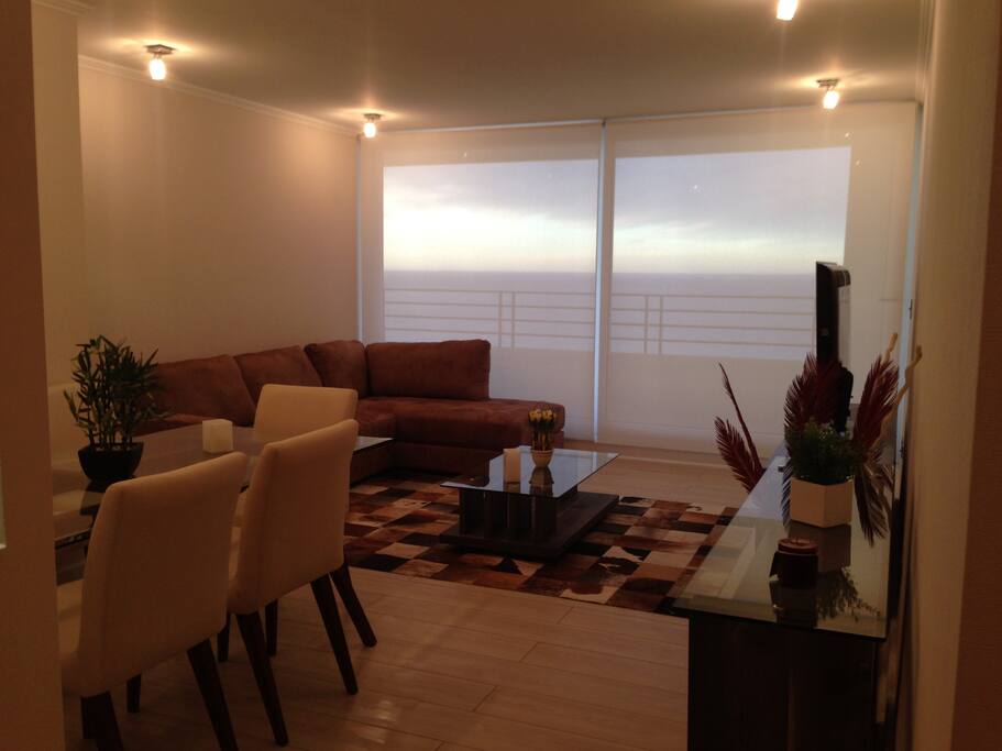 Living comedor y terraza vista al mar