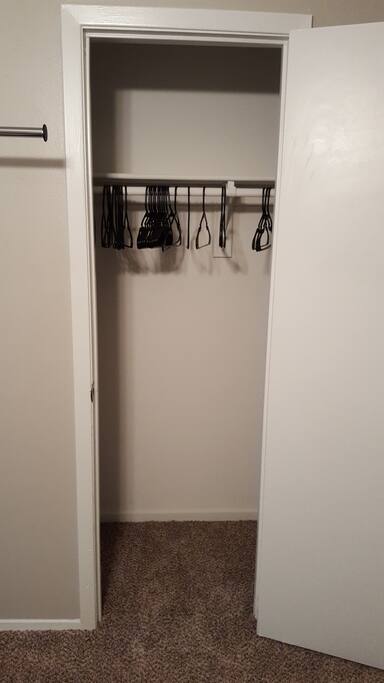 Closet: Use this or the racks in the room to hang clothes.