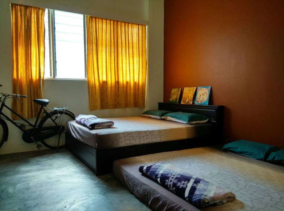 Family room with a queen size and a king size bed