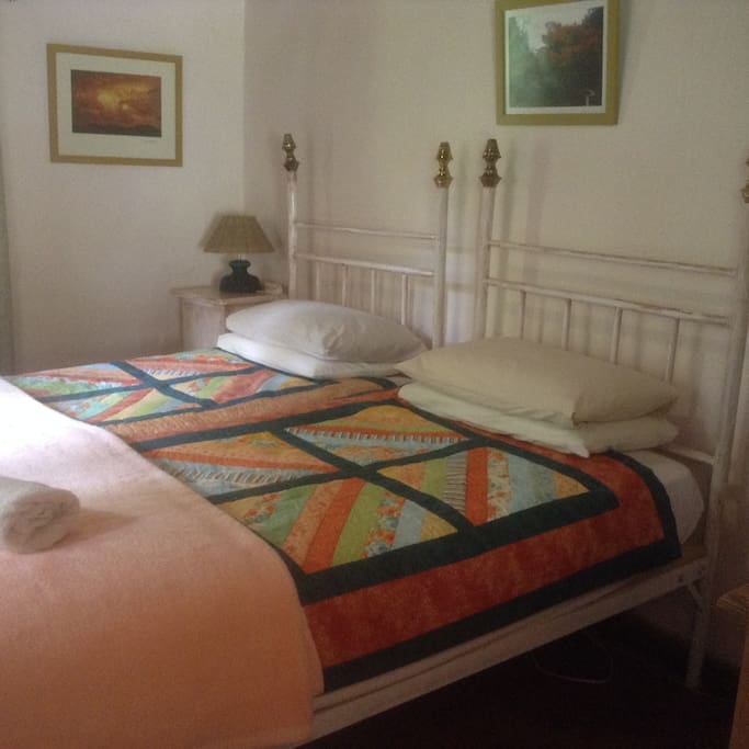Verandah bedroom with two single beds