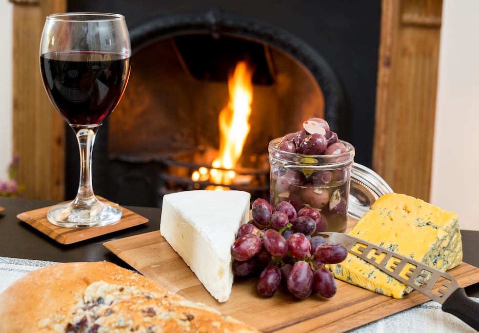 Cheese and wine by an open fire what more could you ask for