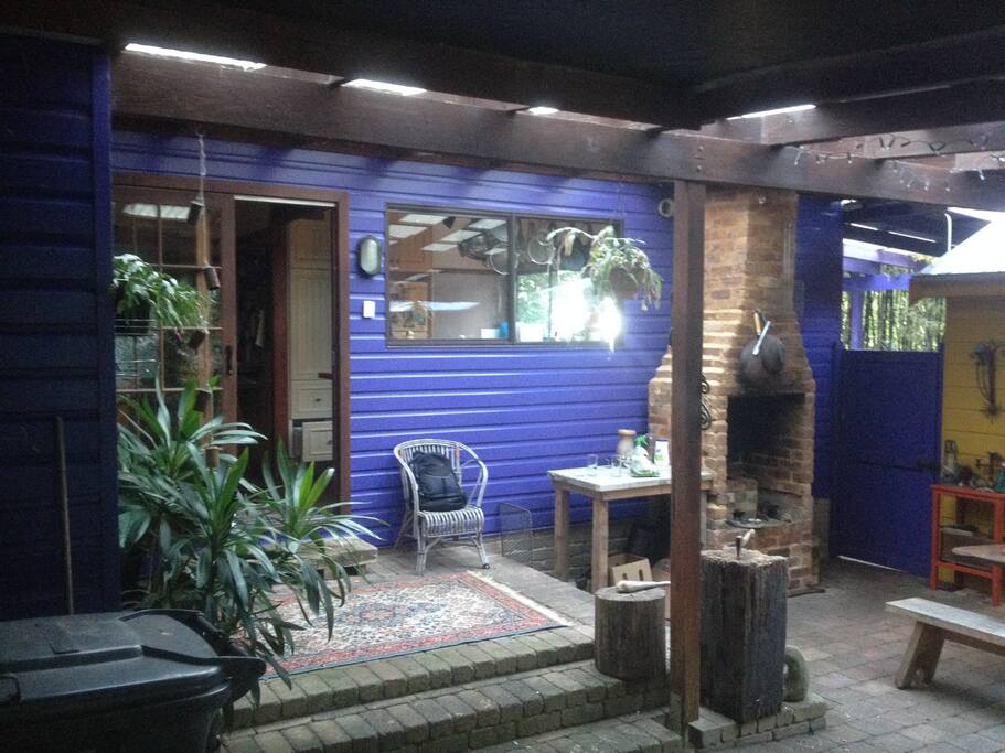Rear courtyard with open fireplace