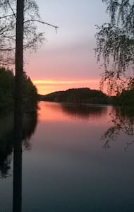 Cosy lakeside log cabin with wood burning sauna