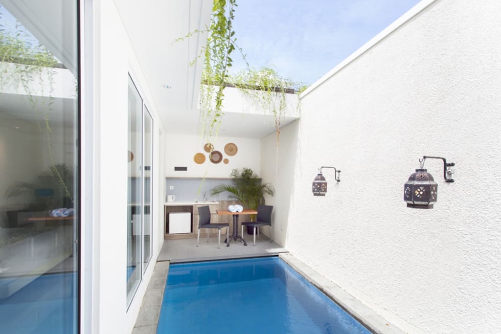 Swimming pool with pantry and dinning table