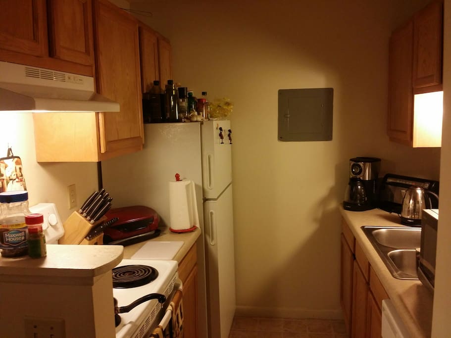 Small kitchen for cooking needs.